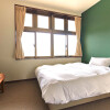 石垣市出售中的整棟旅館/民宿/酒店房地產 西式寢室