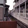 1K Apartment to Rent in Kasuga-shi Building Entrance