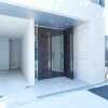 1K Apartment to Rent in Minato-ku Building Entrance
