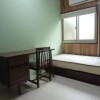 Private Guesthouse to Rent in Osaka-shi Higashinari-ku Bedroom