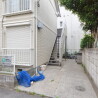 1K Apartment to Rent in Chofu-shi Building Entrance
