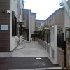 1K Apartment to Rent in Chofu-shi Building Entrance