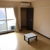 1K Apartment to Rent in Watari-gun Watari-cho Living Room